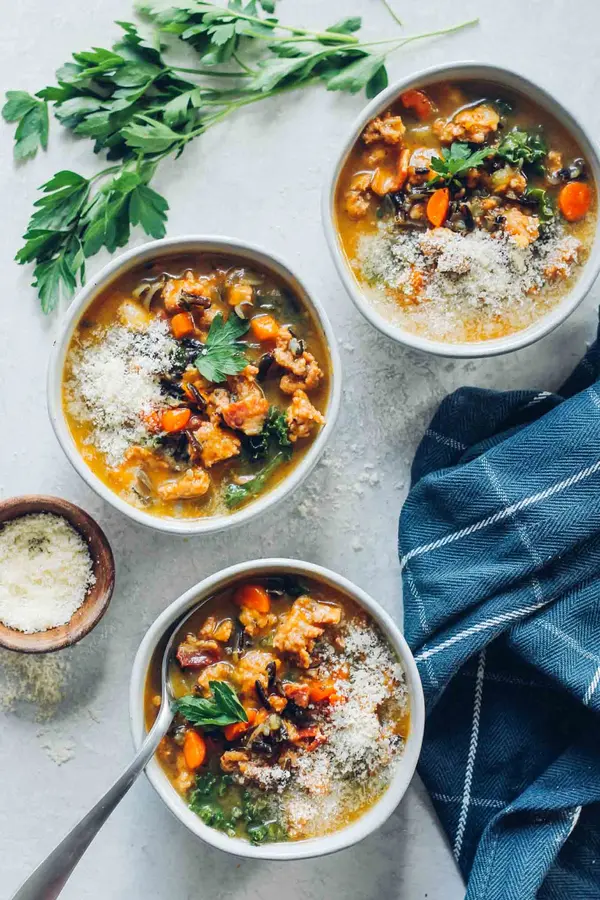 Bowls of squash, sausage, and wild rice soup featured on Hi Energy Life’s website